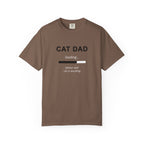 Brown t-shirt with a peace dove graphic and 'professional peacekeeper' text on a white background